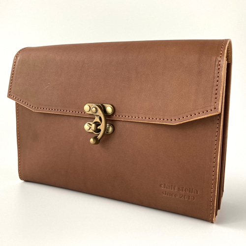 革のポーチ 手帳やノートのコラージュ材料の整理に 手紙などの保管にも